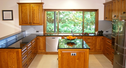 Spacious American Oak by Compass Kitchens with Black Galaxy Granite